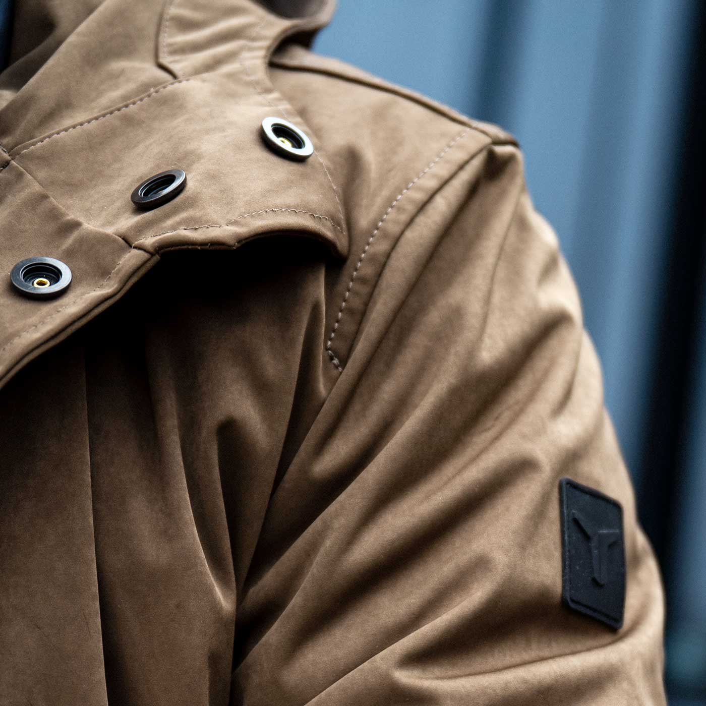 Close-up of the Japanese high-density double-knit (~11 oz / 300 g/m²) on the CADUFF Shirase 2-in-1 Winter Parka; compact shrink-processed texture, soft handfeel.