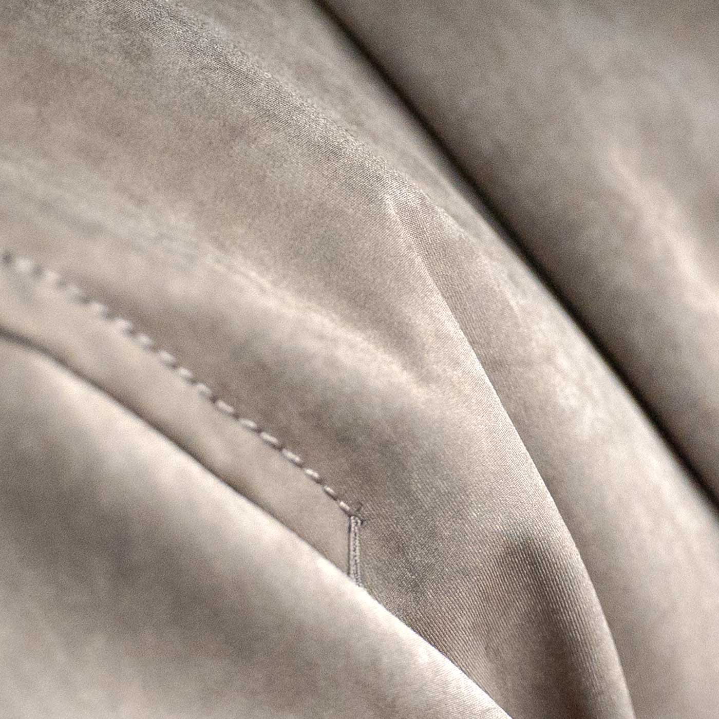 Close-up of the Brown Japanese high-density double-knit on the CADUFF Shirase 2-in-1 Winter Parka, showing the refined soft-touch (peach) surface and dense knit texture.